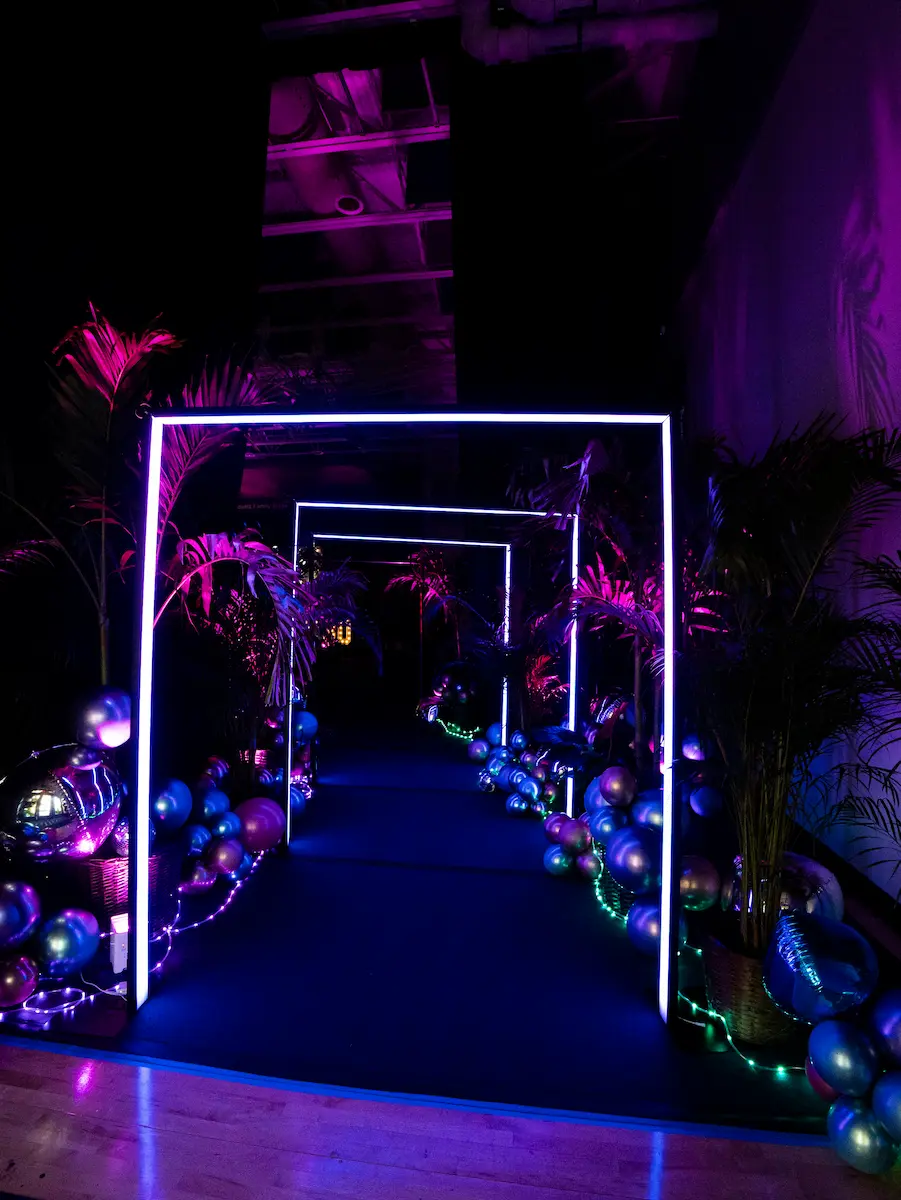 Programmable LED tunnel entrance creating a modern walkway at a South Florida venue