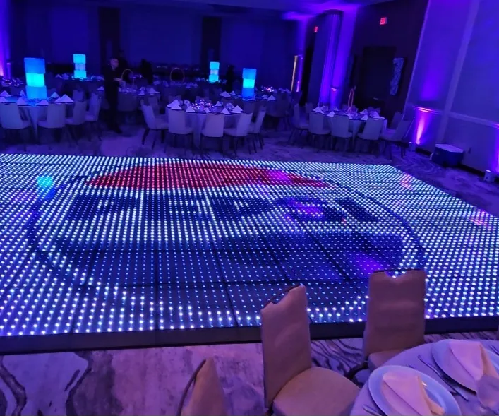 Pixel LED dance floor paired with a traditional stage and LED video screen