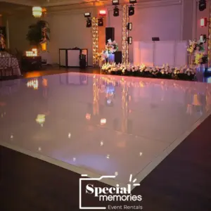 Luxury white dance floor rental with glossy finish for an elegant wedding reception in Miami.