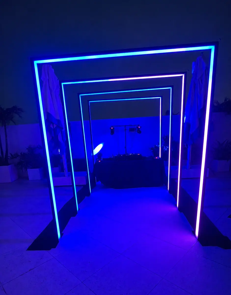 Rectangular LED tunnel rental illuminated in blue for a Palm Beach event
