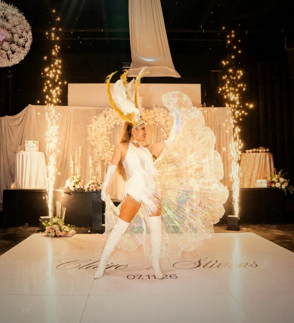 Female dancer on a white wedding floor with indoor cold sparklers in Boca Raton