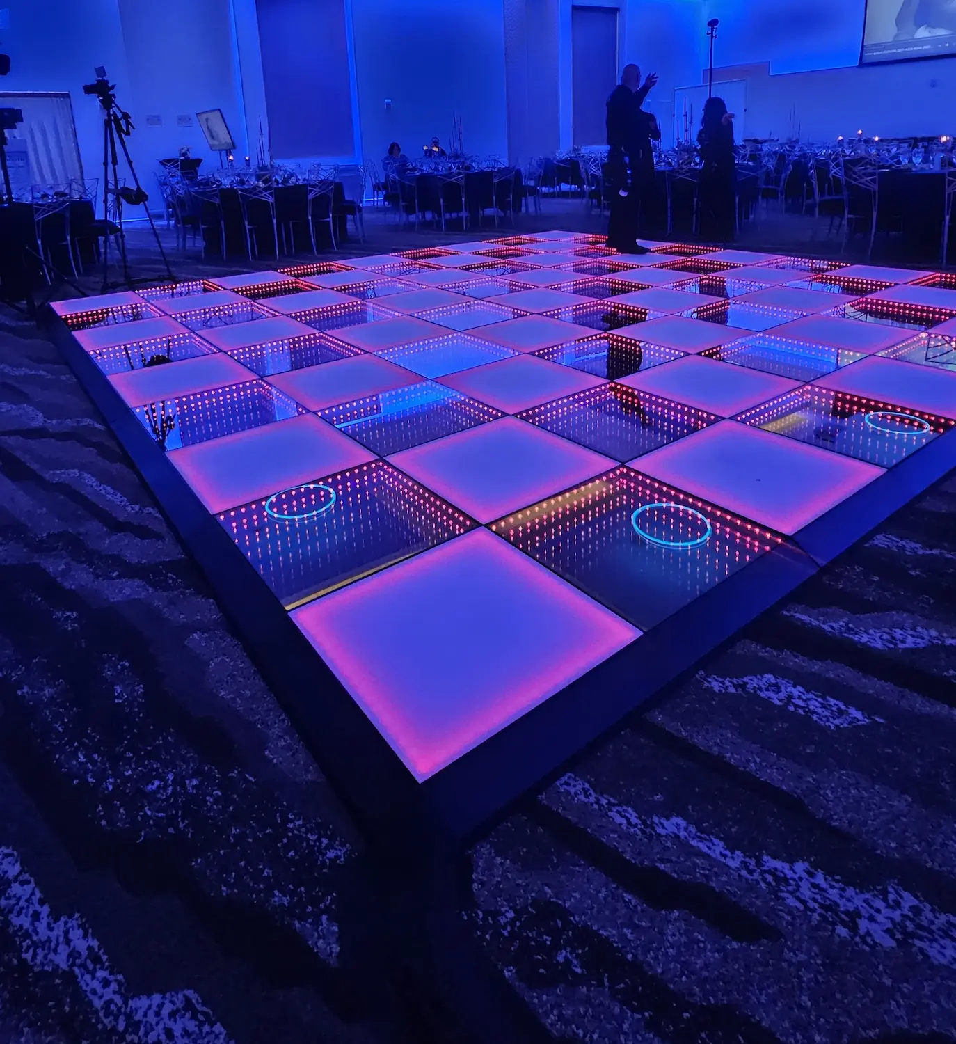 Purple and blue Infinity 3D LED dance floor at a Sunrise Florida quinceañera