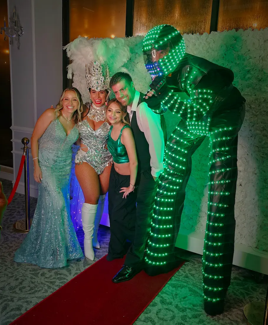 LED robot performing with an optional CO2 gun during a high-energy party