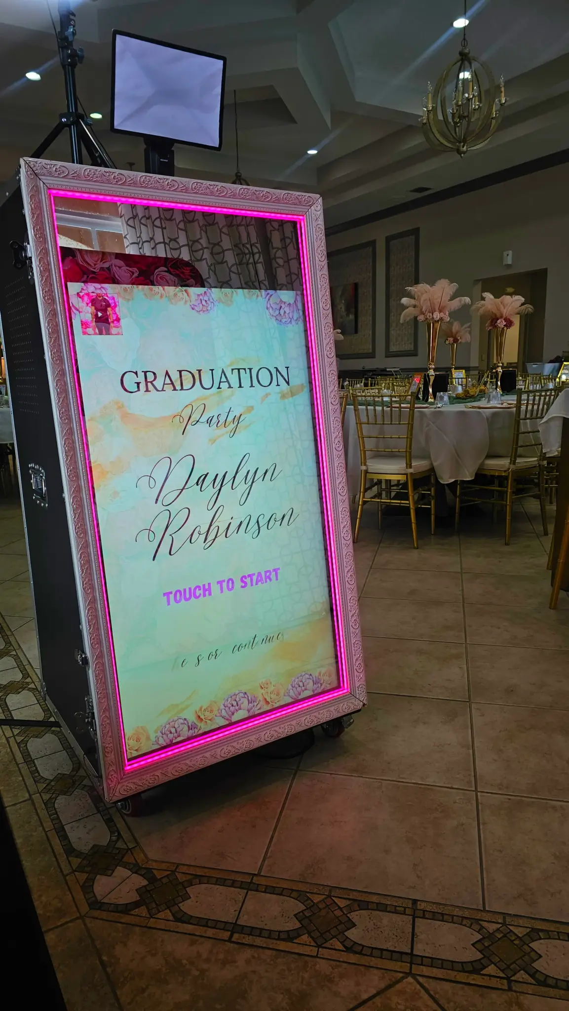 Magic Mirror Photo Booth rental with professional DSLR camera in Hollywood, Florida.