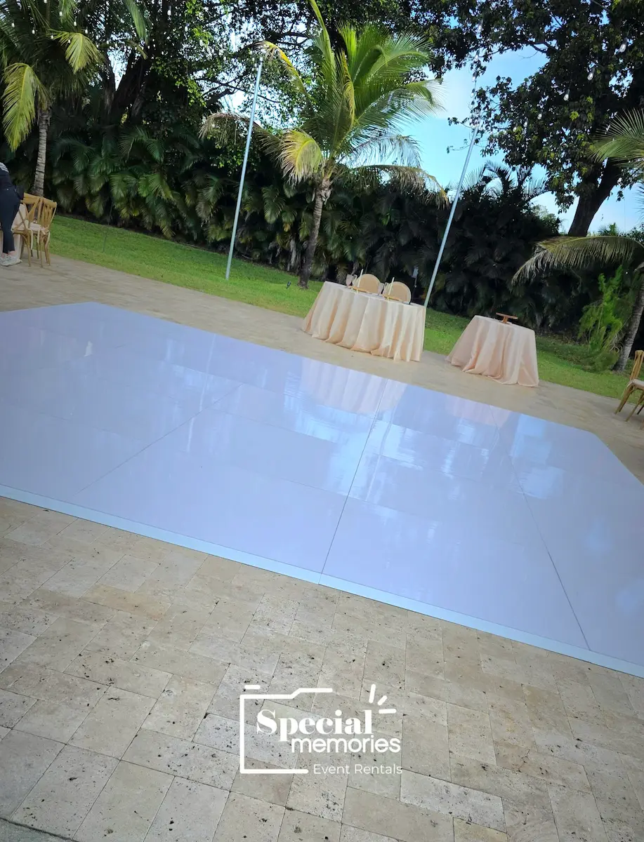 Oversized 4x4 white dance floor panels creating a seamless luxury appearance.