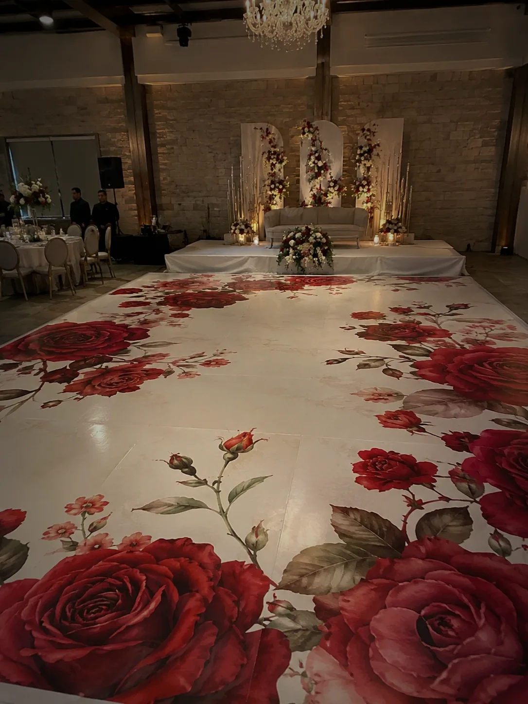 Custom wedding floor wrap with oversized red roses for an elegant Fort Lauderdale reception
