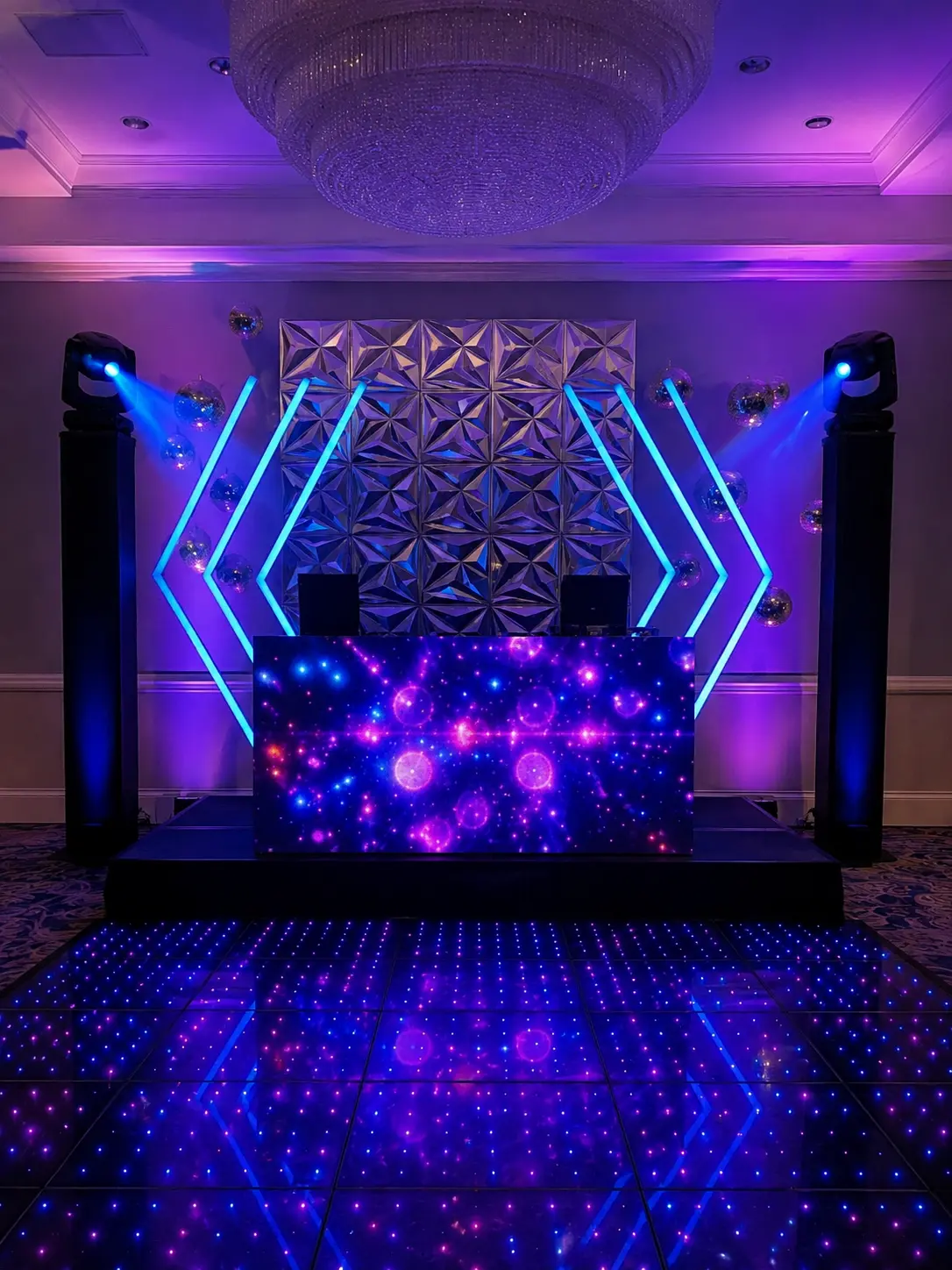 Half-diamond LED arch entrance with white and blue lighting in Broward County