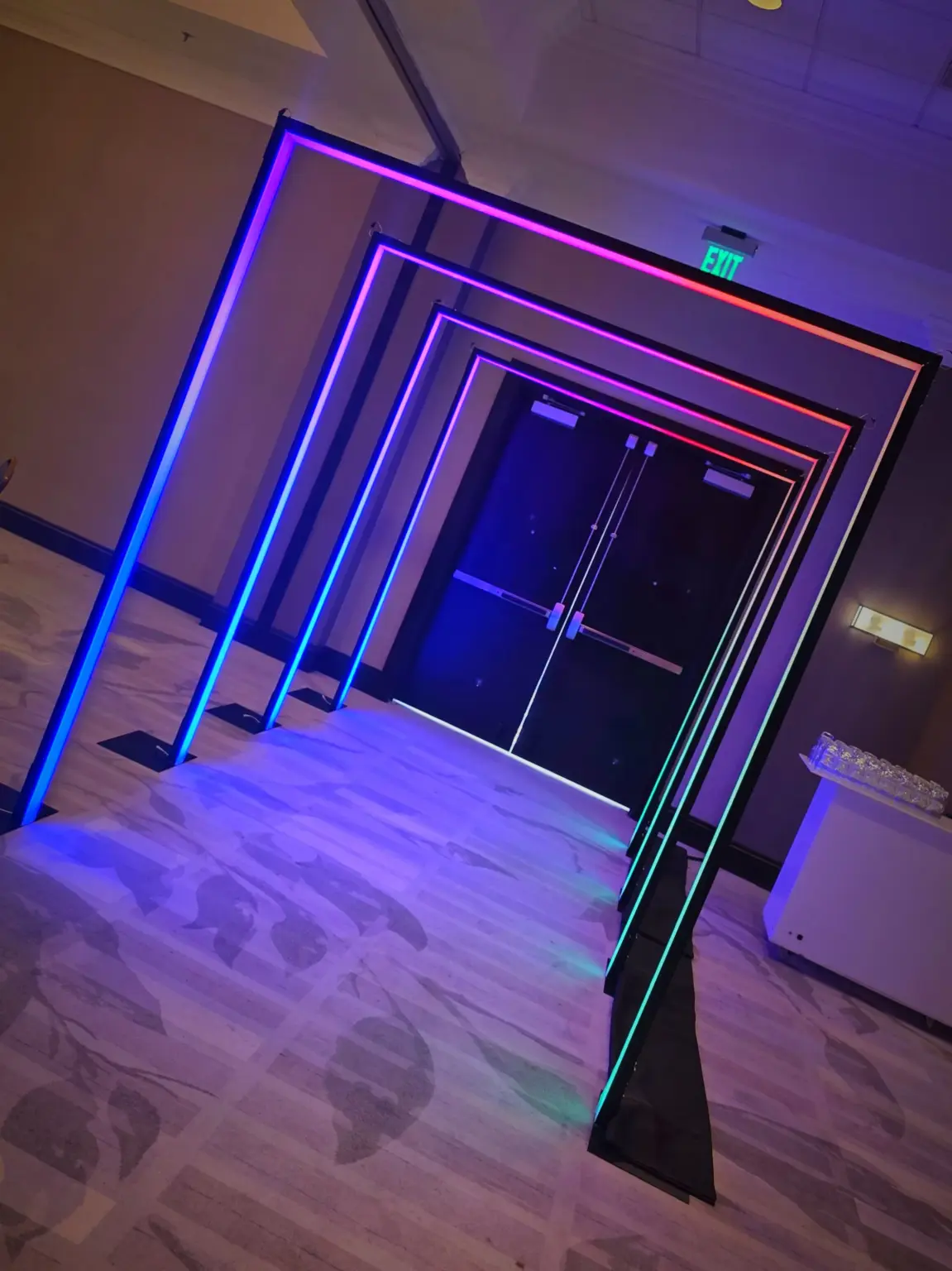 Rectangular LED arch tunnel rental illuminated in blue for an event in Hollywood Florida