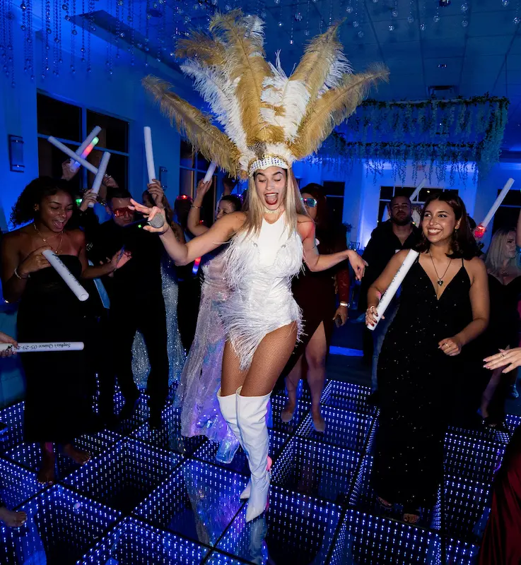 Professional Hora Loca female dancers entertaining guests at a Miami celebration