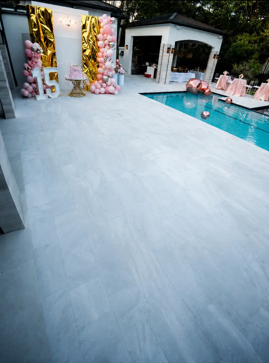 Poolside area at a Kendall Miami residence before the illuminated LED dance floor was installed for a quinceañera