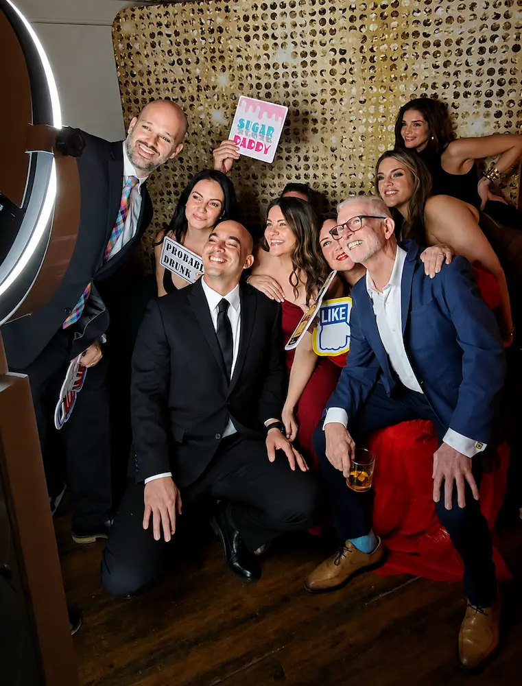 Wedding guests using iPad Photo Booth in Coral Gables