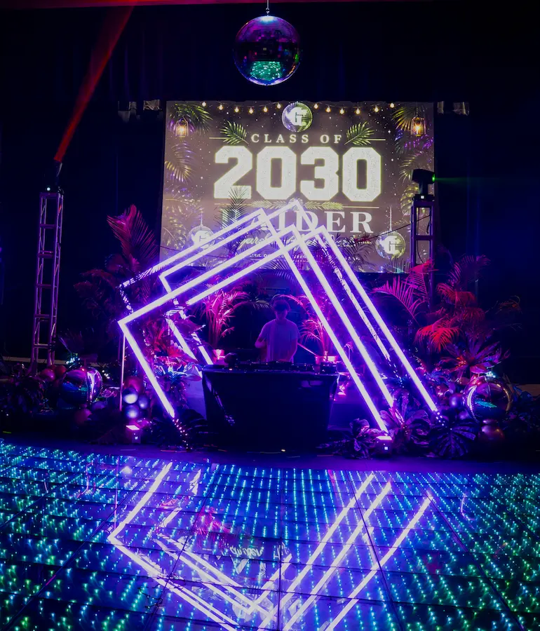 20 by 20 light-up Pixel LED dance floor with geometric LED arches and DJ area at a Coral Gables school dance