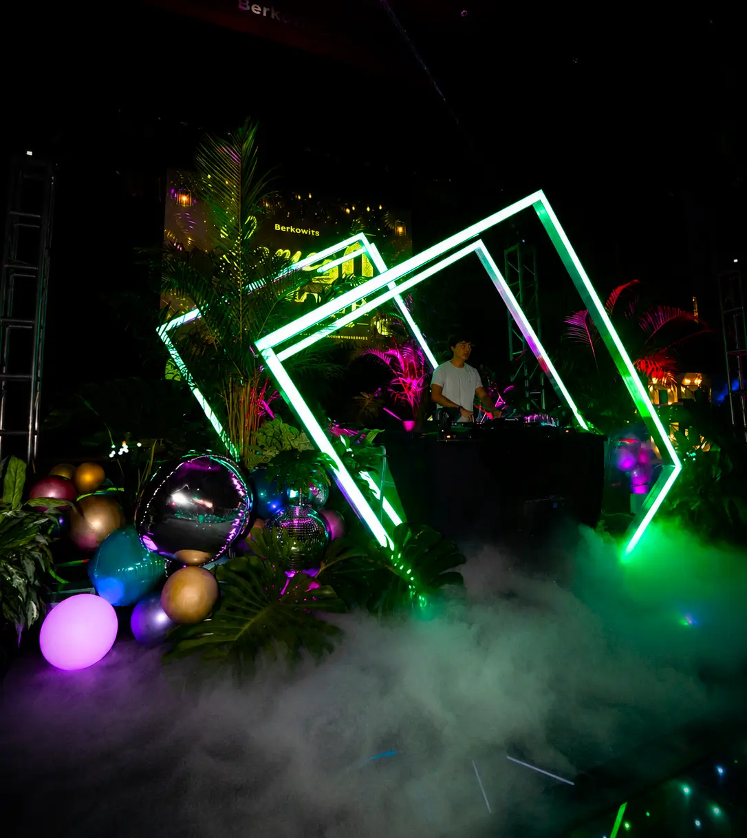 Four angled square LED arches used as a geometric DJ backdrop at a Coral Gables school dance