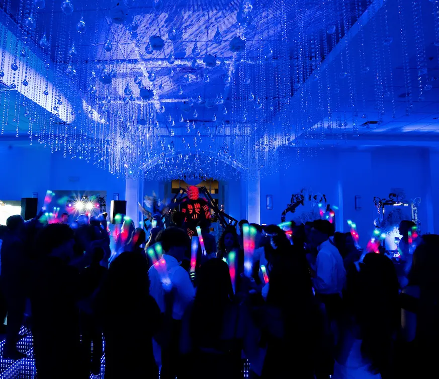 High-energy South Florida party with LED robot entertainment and guests celebrating