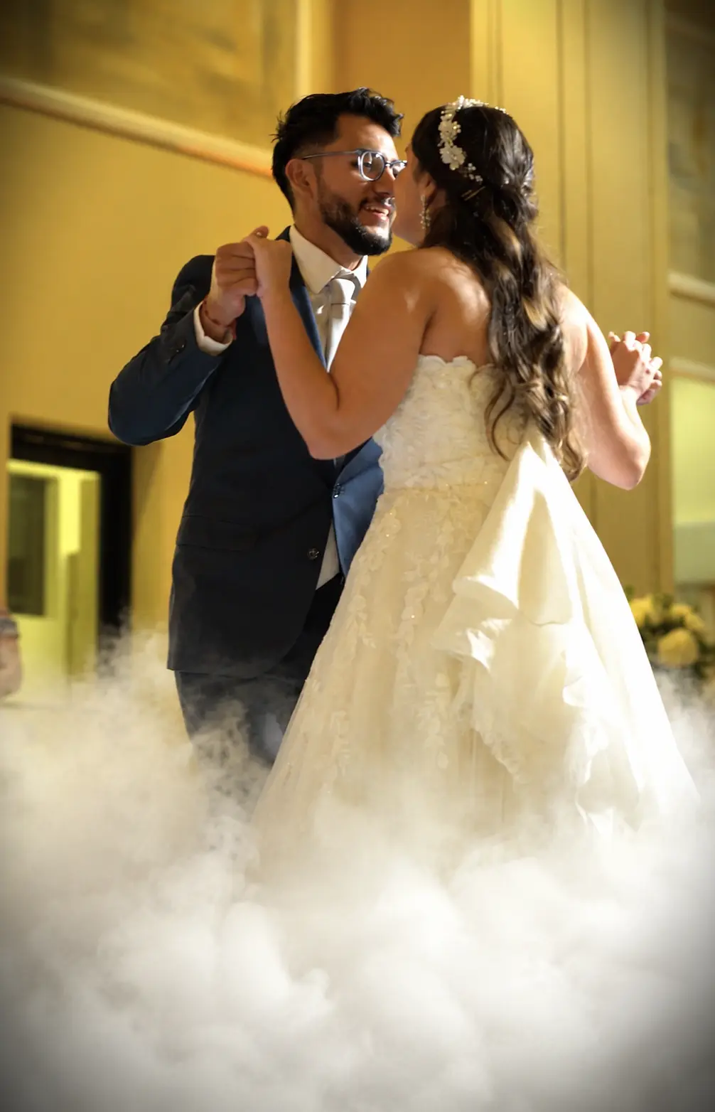 Bride and groom dancing in the clouds during their first dance at MiraLago Clubhouse in Parkland