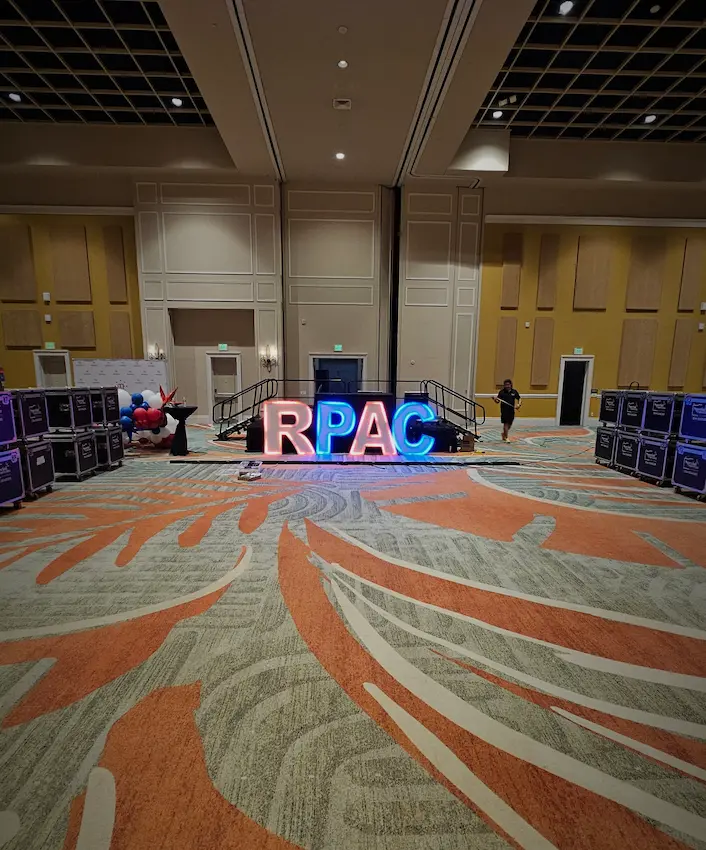 Rosen Shingle Creek ballroom before LED dance floor installation with a 12 by 8 event stage visible in the background