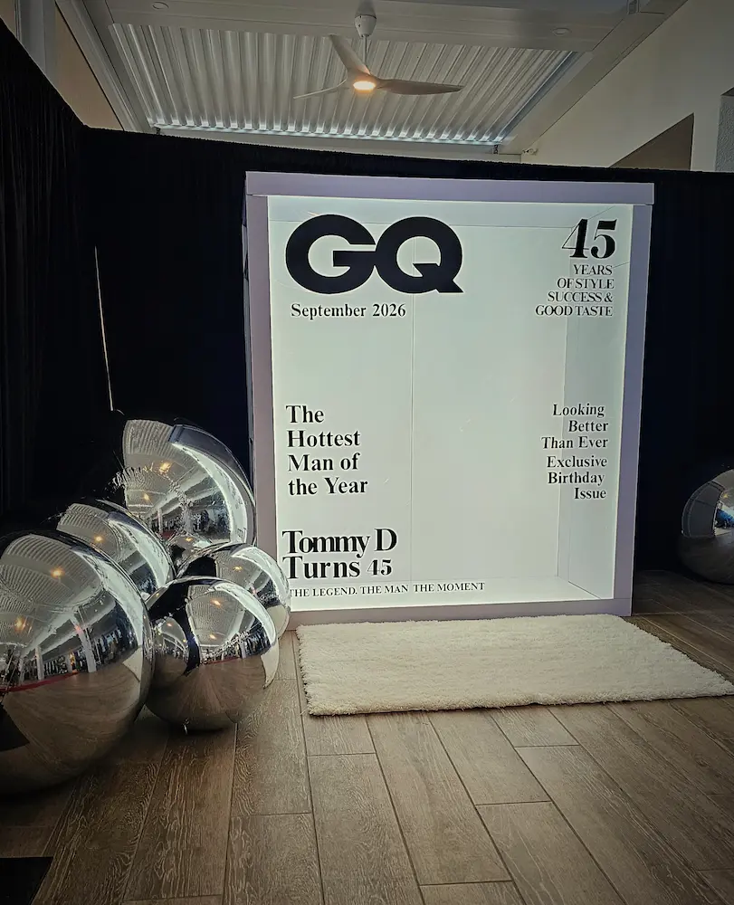 Silver inflatable mirror spheres at a 45th birthday celebration in Boca Raton