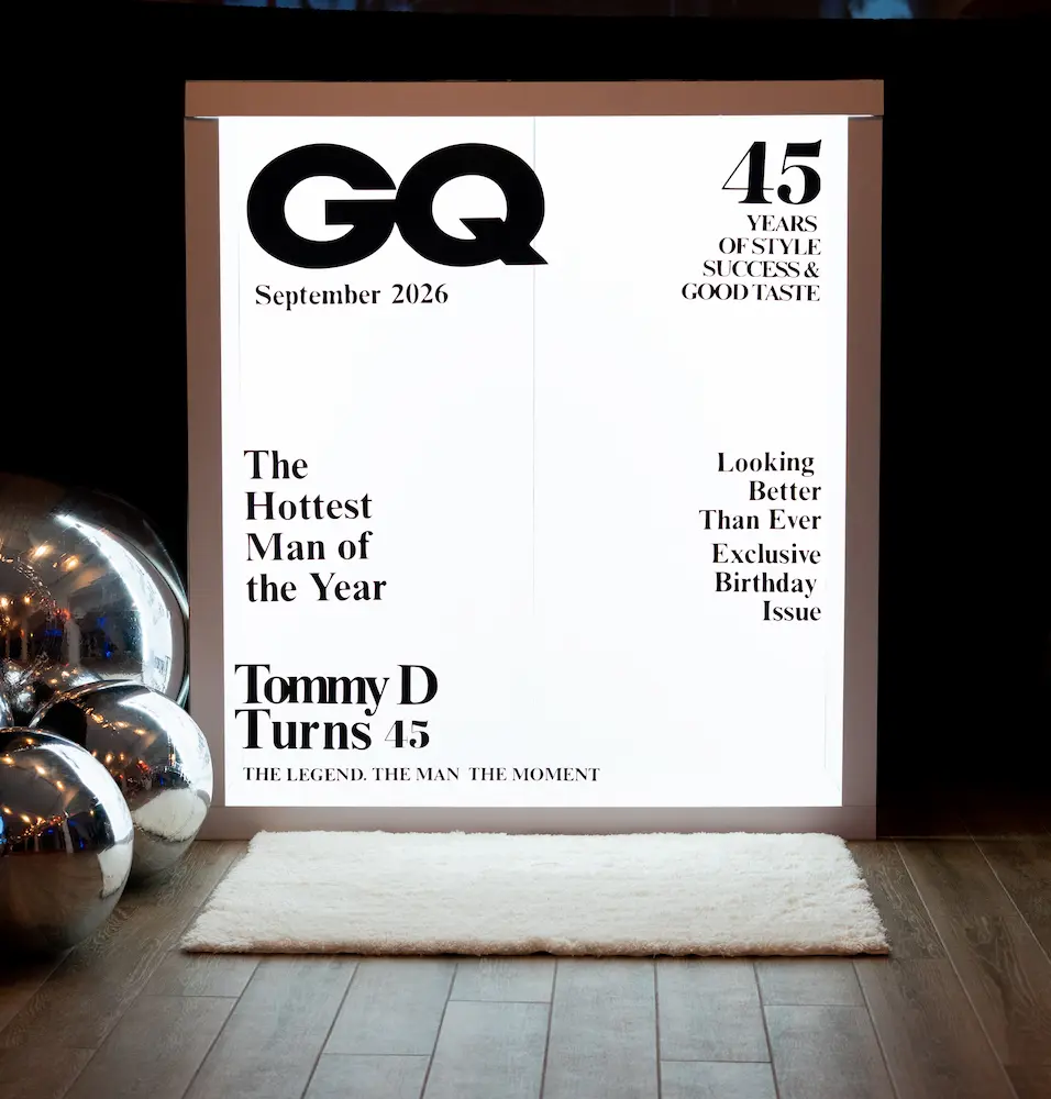 Custom 45th birthday Magazine Cover Booth with silver mirror balls at The Boca Raton Beach Club