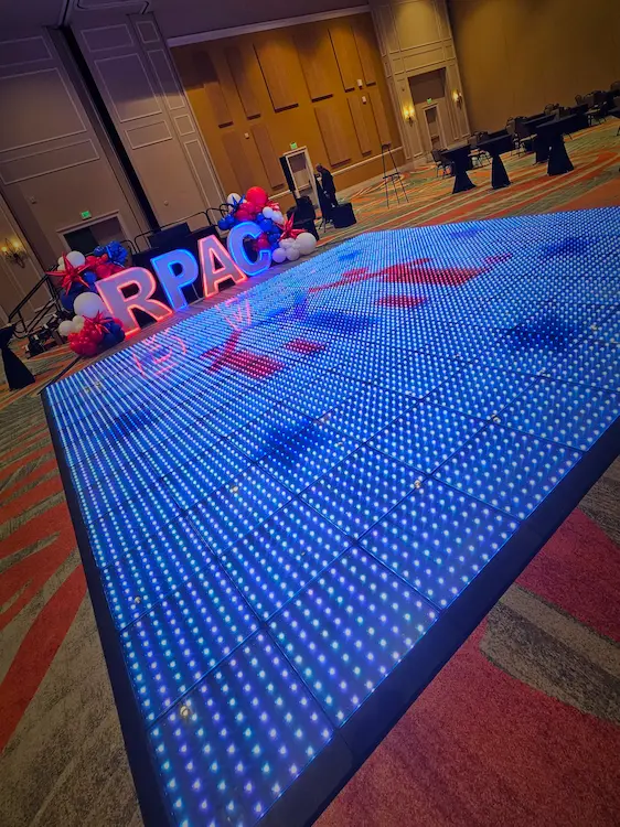 Pixel LED dance floor displaying RPAC branding at a corporate event in Orlando