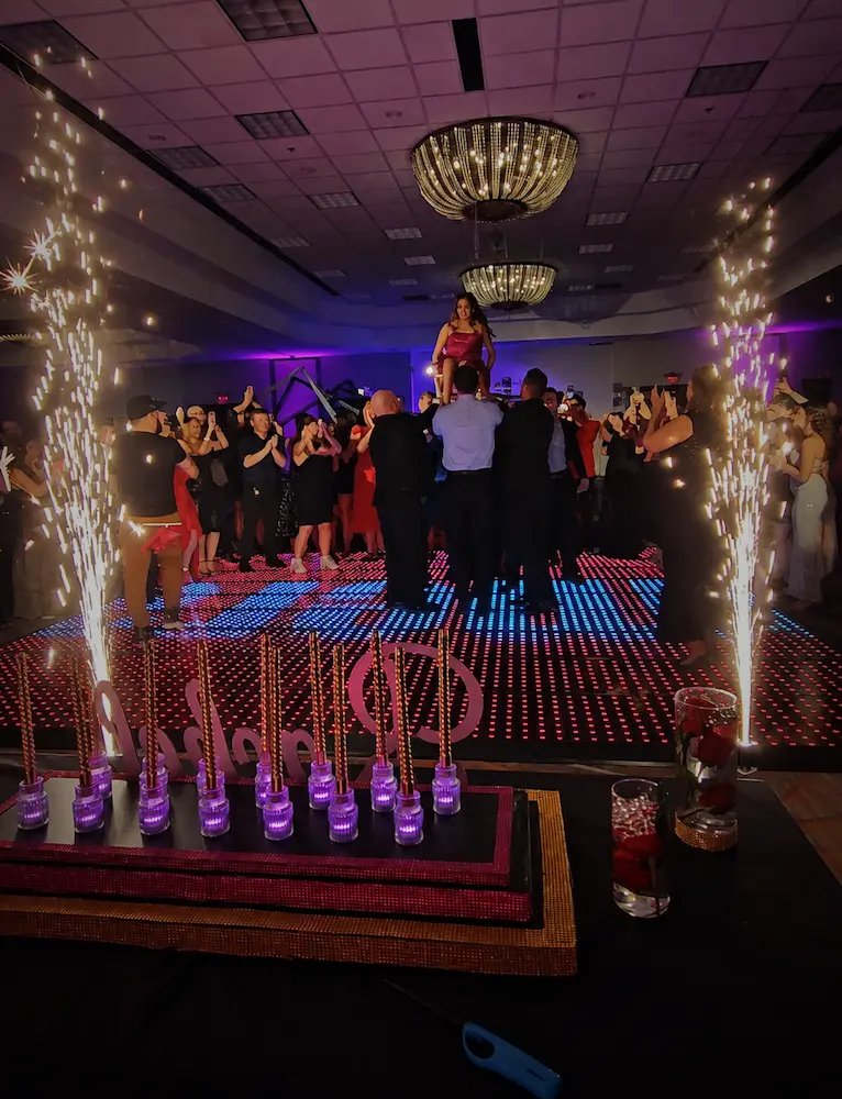 Two cold spark fountains framing a Bat Mitzvah dance-floor celebration