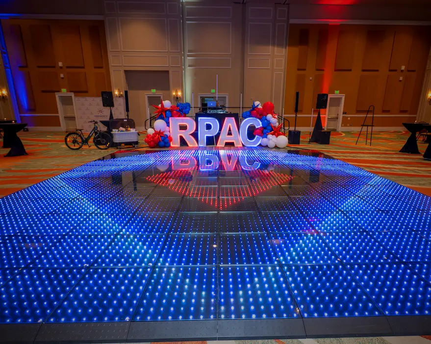 Florida Realtors PAC Jamboree ballroom with a large branded Pixel LED dance floor at Rosen Shingle Creek in Orlando
