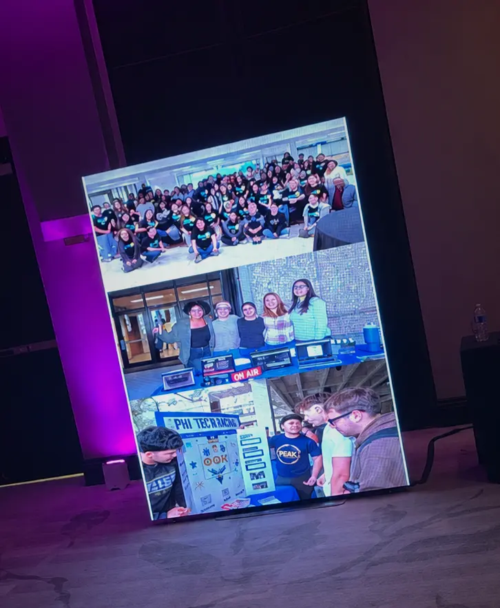 Vertical LED screen displaying corporate event photographs in Fort Lauderdale