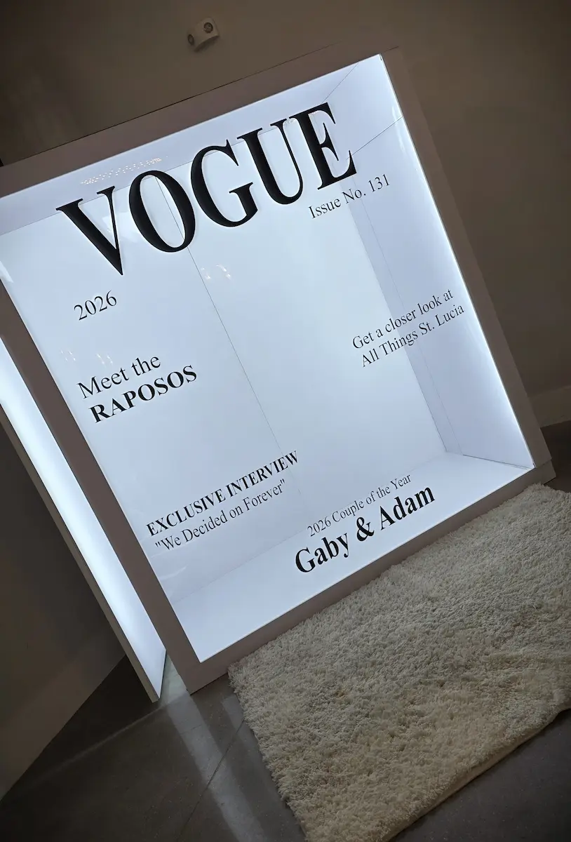 Custom wedding Magazine Cover Booth with couple names and editorial headlines