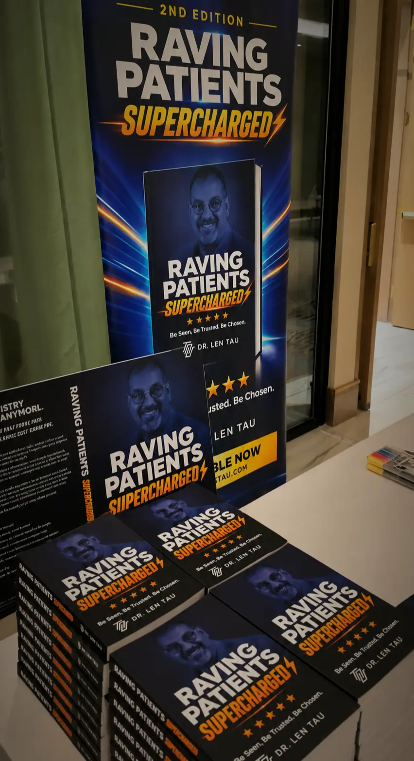 Raving Patients Supercharged books and promotional signage at the Supercharge dental conference