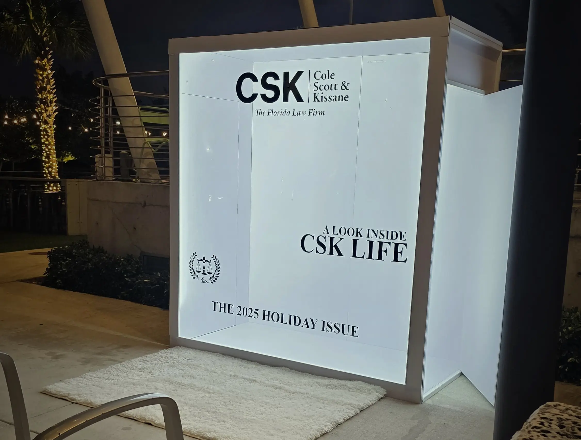 Angled view of the CSK magazine box and entrance rug at Bayshore Club in Coconut Grove