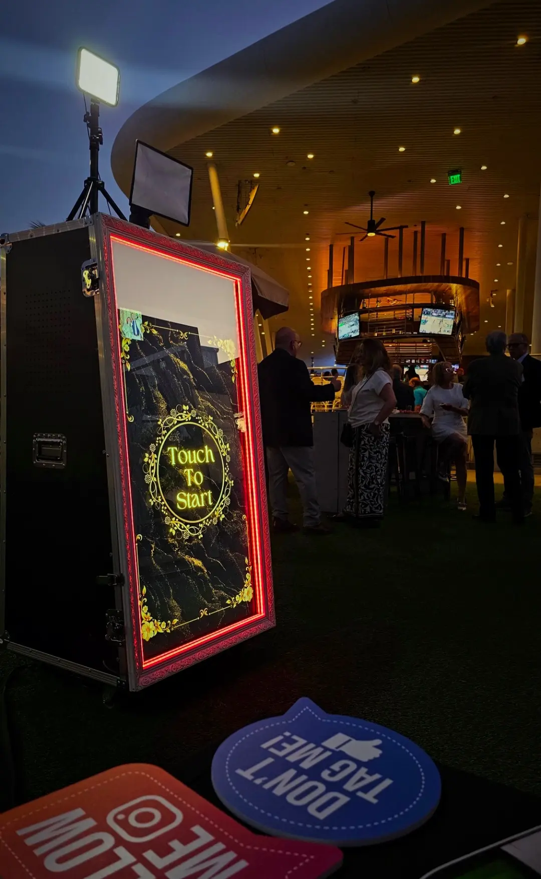 Illuminated Magic Mirror with Touch to Start screen during the Miami corporate holiday party