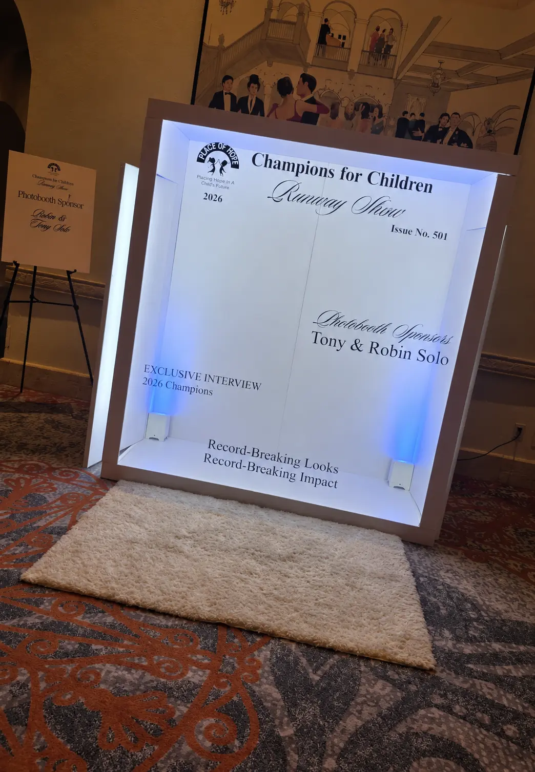 Customized Champions for Children Runway Show magazine booth inside The Boca Raton
